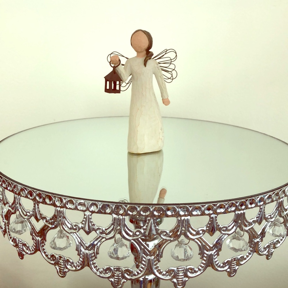 Willow Tree - Angel of Hope. Girl holding lantern.